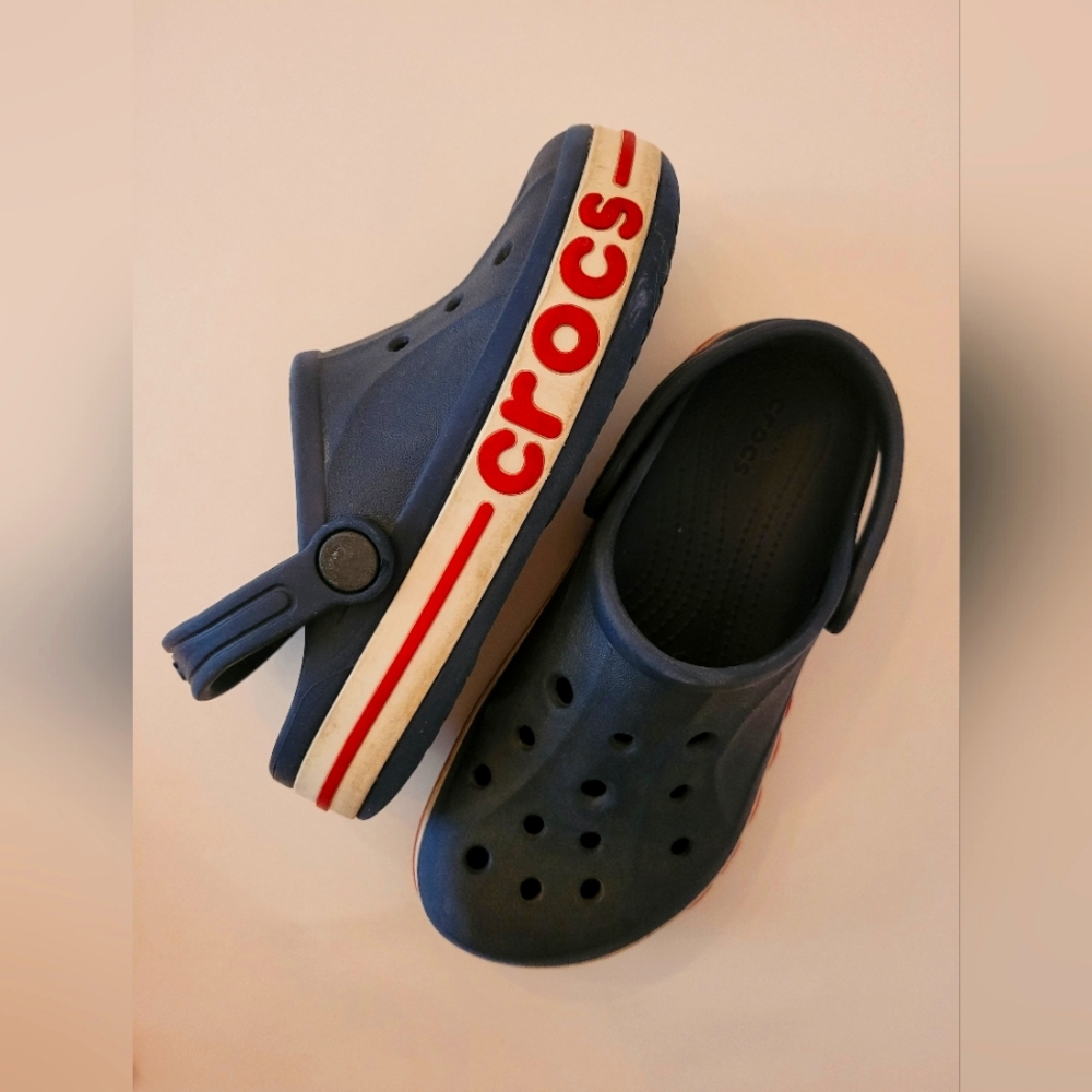 Crocs, blue with red lettering, size J1